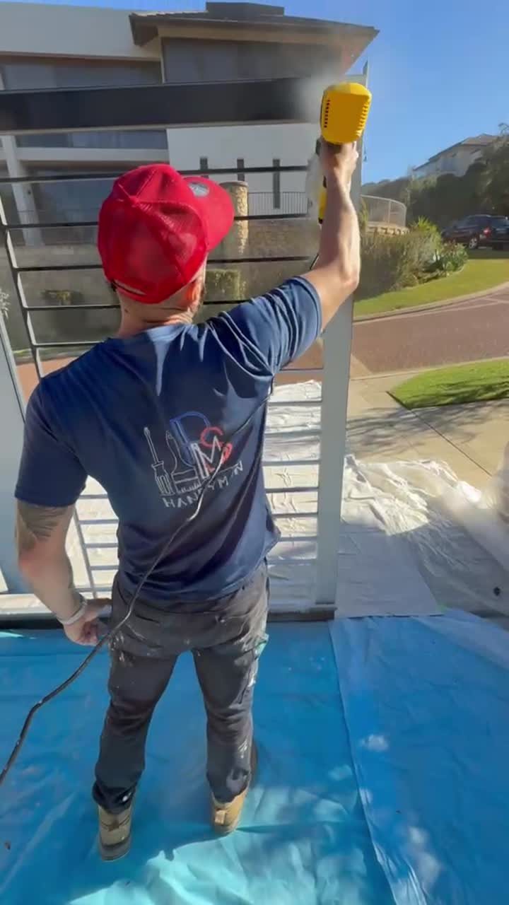 Perth Multiservices painting a gate in Perth