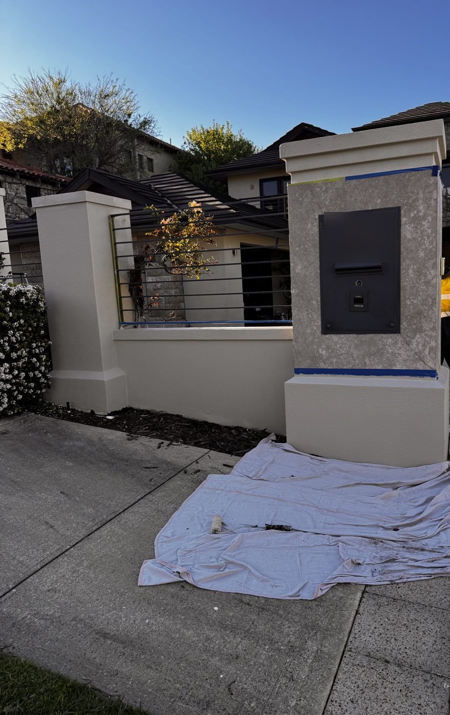 Rendered pillar and letterbox masked up and painted